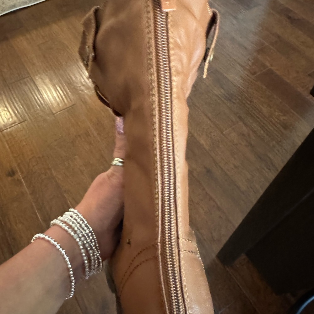 Size 7 brown combat boots… wear up or down. Worn once